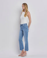 HIGH RISE UNEVEN RAW HEM KICK FLARE JEANS