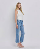 HIGH RISE UNEVEN RAW HEM KICK FLARE JEANS