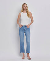 HIGH RISE UNEVEN RAW HEM KICK FLARE JEANS