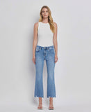 HIGH RISE UNEVEN RAW HEM KICK FLARE JEANS