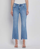 HIGH RISE UNEVEN RAW HEM KICK FLARE JEANS