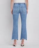 HIGH RISE UNEVEN RAW HEM KICK FLARE JEANS