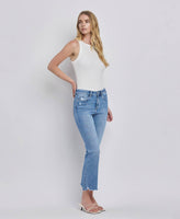 HIGH RISE UNEVEN RAW HEM KICK FLARE JEANS