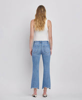 HIGH RISE UNEVEN RAW HEM KICK FLARE JEANS